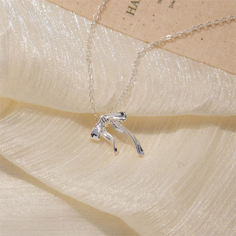 Elegant Scrub Bow Pendant Necklace